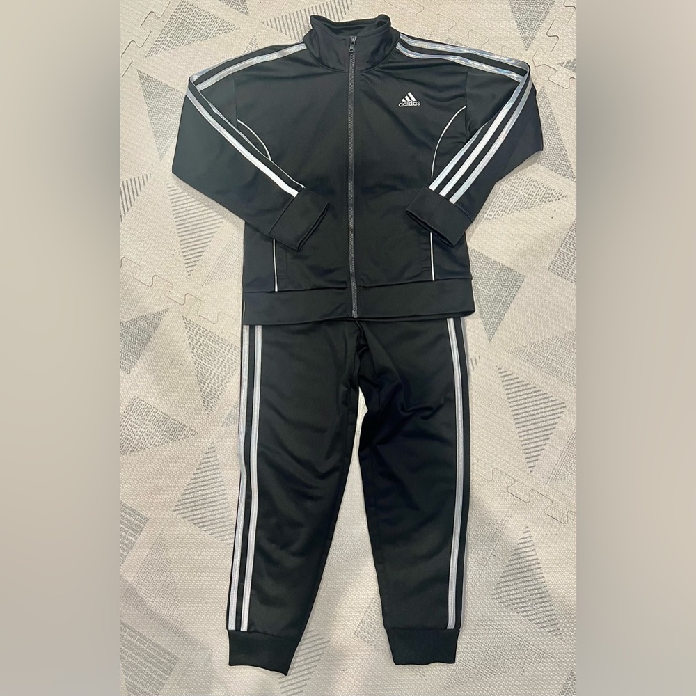 Girls adidas tracksuit, black w/ metallic stripes. Great condition, lightly worn